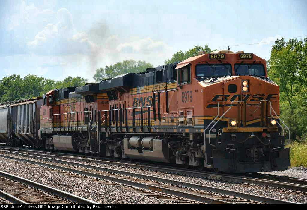 Grain train rolls east